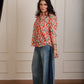 Elara orange shirt