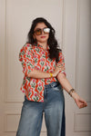 Elara orange shirt